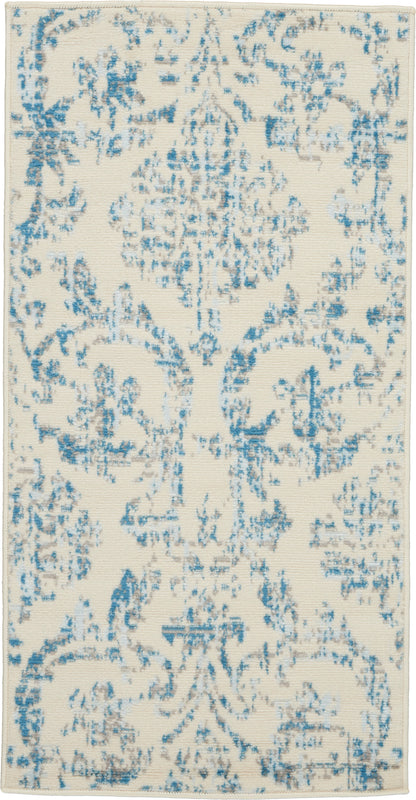 Cream rug with a blue distressed damask pattern, rectangular area rug for living room or hallway.