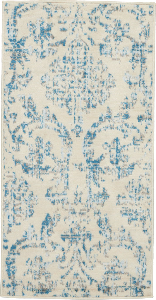 Cream rug with a blue distressed damask pattern, rectangular area rug for living room or hallway.
