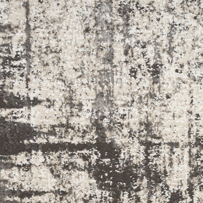 Beige and taupe abstract-pattern rug with dark brown distressed accents; plush woven texture.