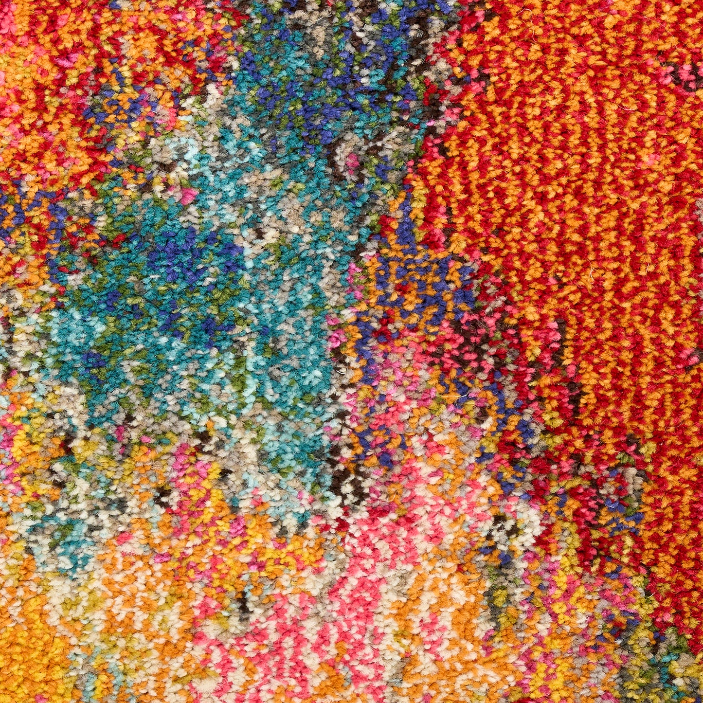 Vibrant multicolor shag rug with teal, blue, pink, orange, red and yellow hues in an abstract, textured pattern.