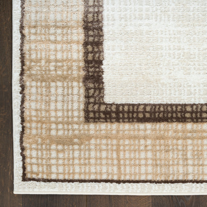 Beige rectangular area rug with cream center, dark brown border and subtle grid texture on wood floor
