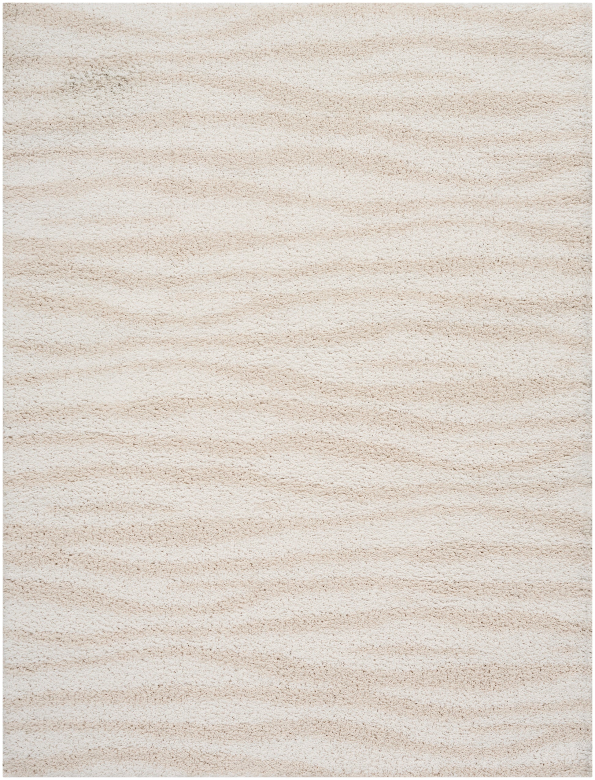 Cream beige shag rug with plush pile and subtle wavy texture.