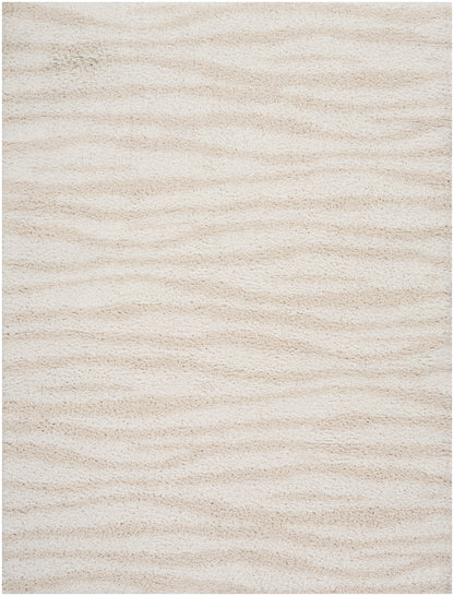 Cream beige shag rug with plush pile and subtle wavy texture.