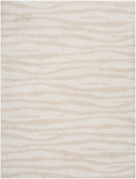 Cream beige shag rug with plush pile and subtle wavy texture.