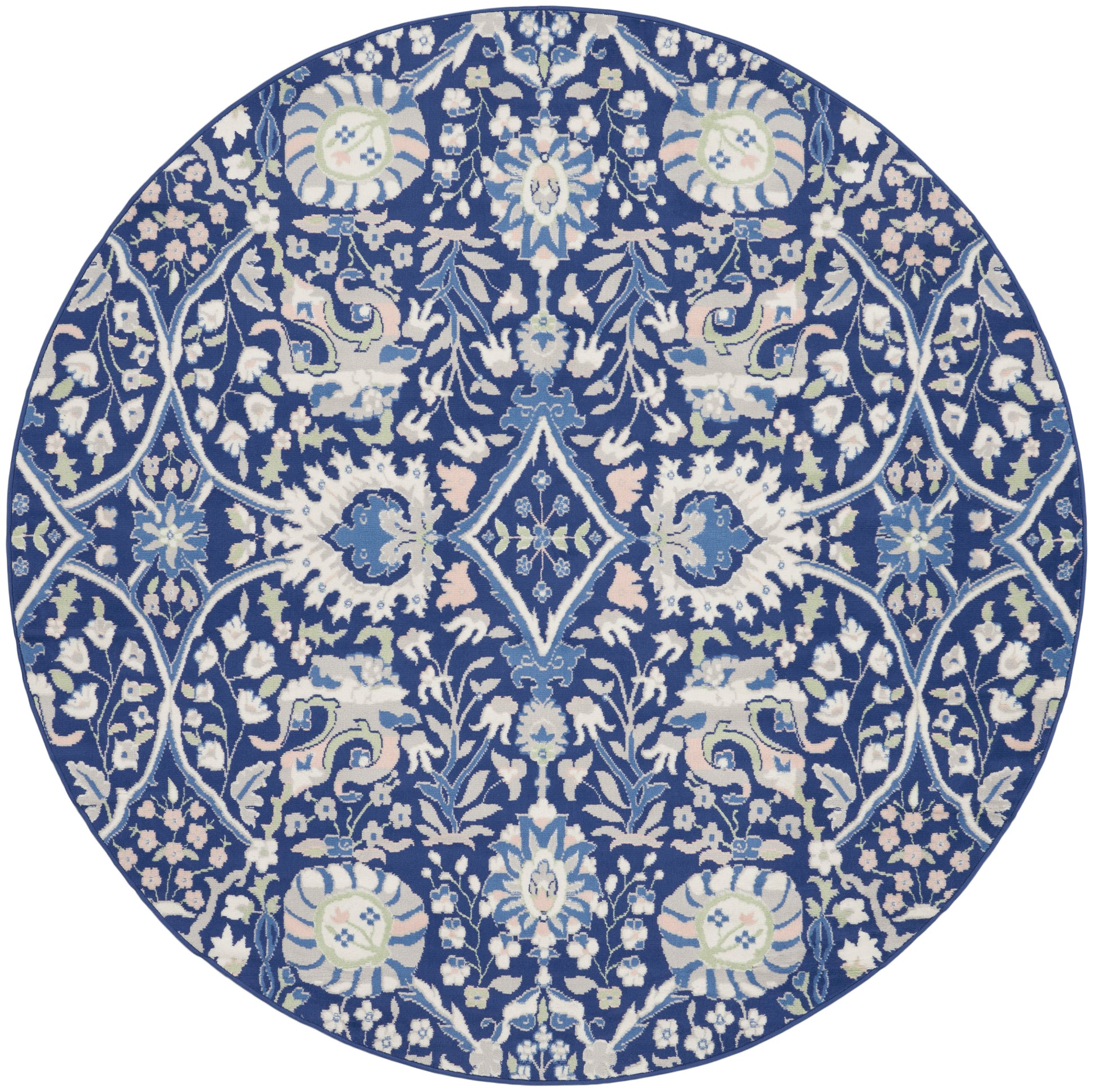 Round blue and white rug with dense floral vines, medallions and lattice motifs in a porcelain-inspired design.