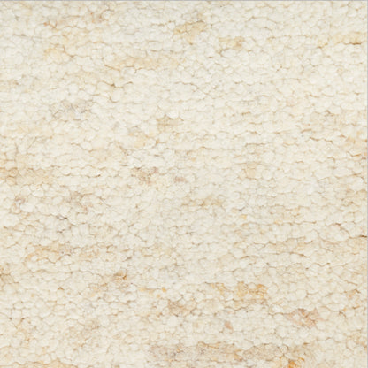 Cream crackled texture resembling parched earth, beige-toned surface with tiny polygonal scales.