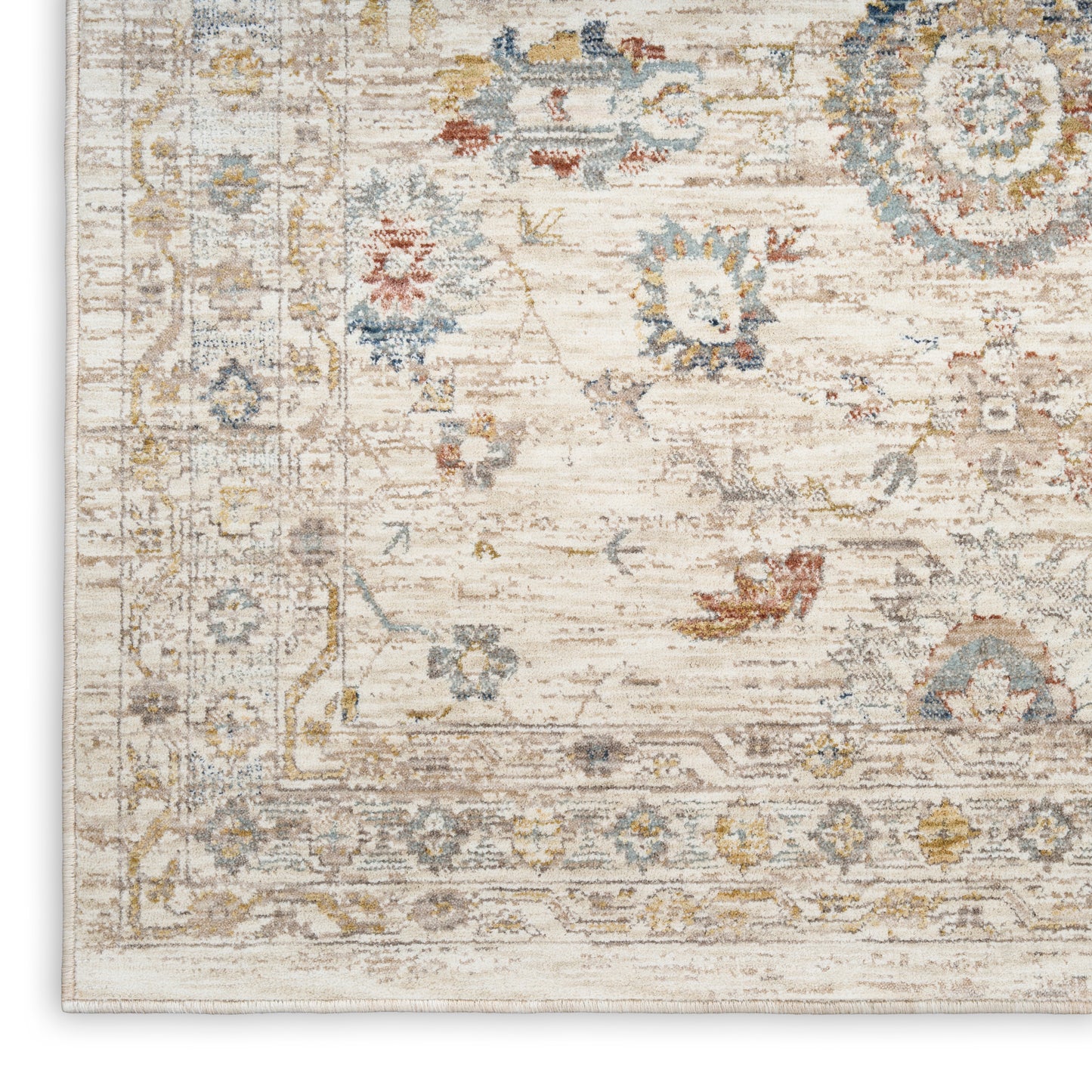 Cream distressed oriental rug with pale blue, gold and grey floral motifs and decorative border.