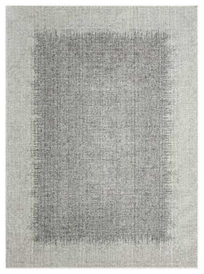 Rectangular neutral-gray rug with a faded dark center and lighter outer border; modern textured.