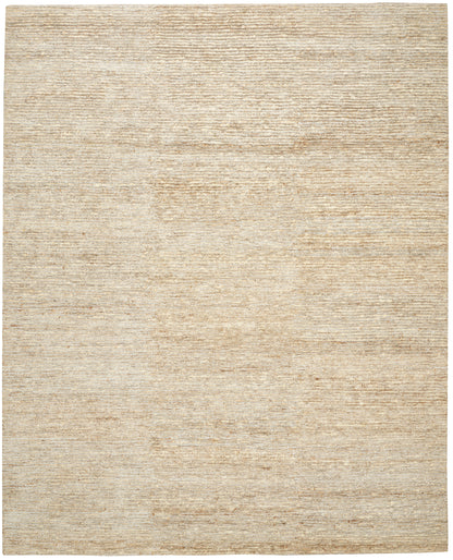 Beige textured area rug with subtle woven pattern in warm sandy tones.