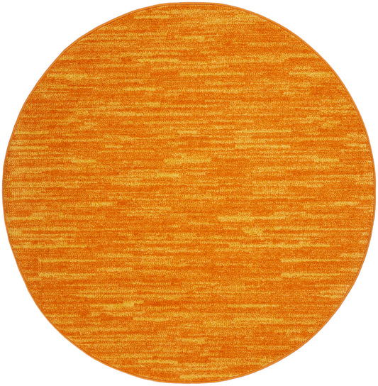 Round orange rug with heathered texture and subtle streaks; soft decorative floor covering.