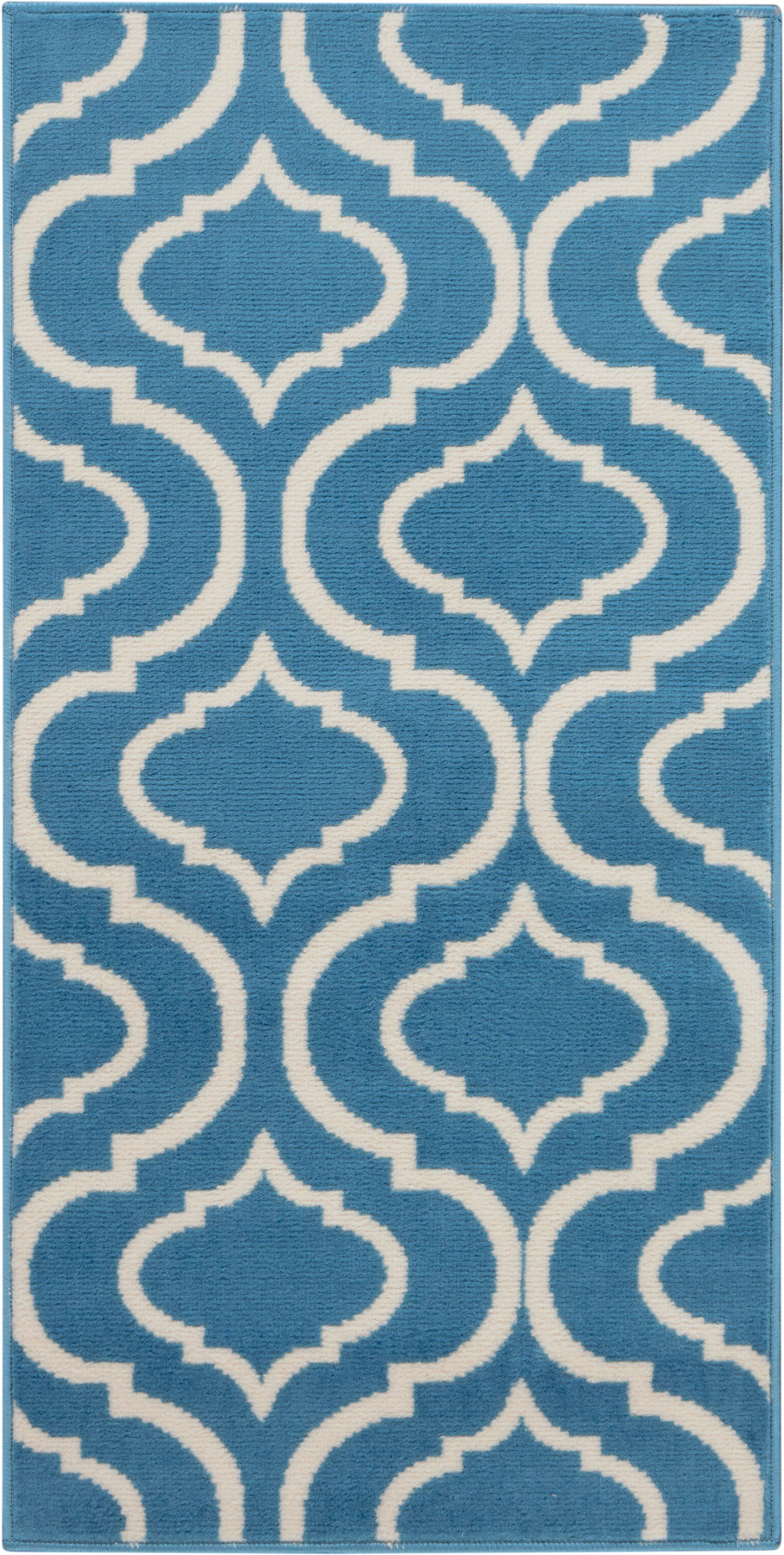 Blue rug with a white Moroccan trellis pattern, plush pile, rectangular 2' x 4' rug.