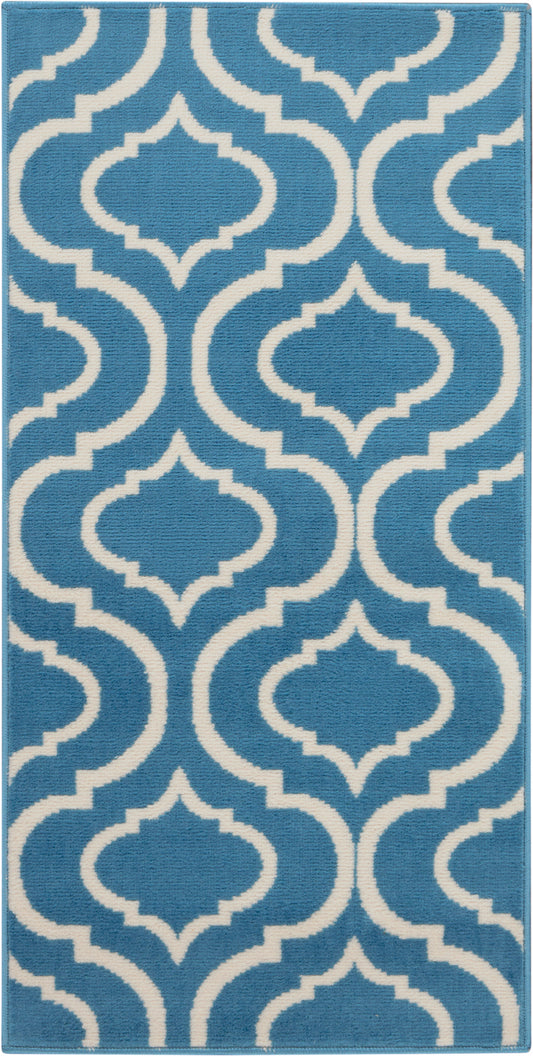 Blue rug with a white Moroccan trellis pattern, plush pile, rectangular 2' x 4' rug.