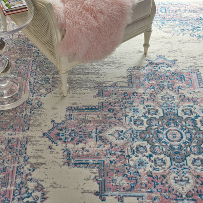 Blue-pink oriental rug, vintage 7' x 10'.