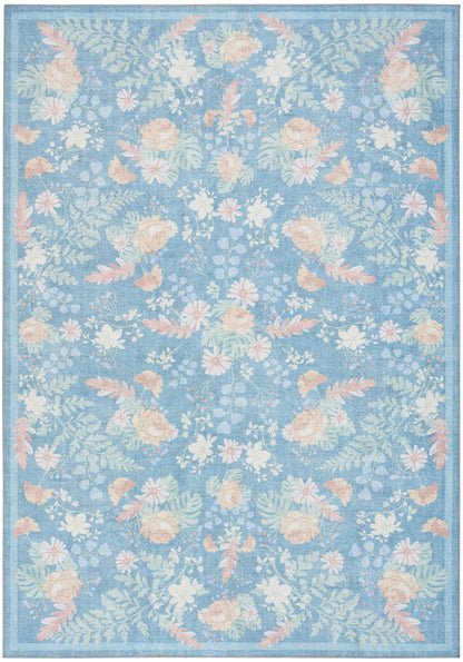 Blue floral rug featuring peach and white flowers with green leaves and a decorative border.