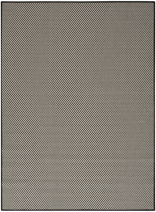 Beige diamond-pattern rug with black border; fine woven texture (6' x 9').