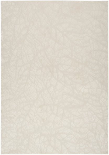 Cream beige rug with a subtle irregular pattern and a soft matte finish.