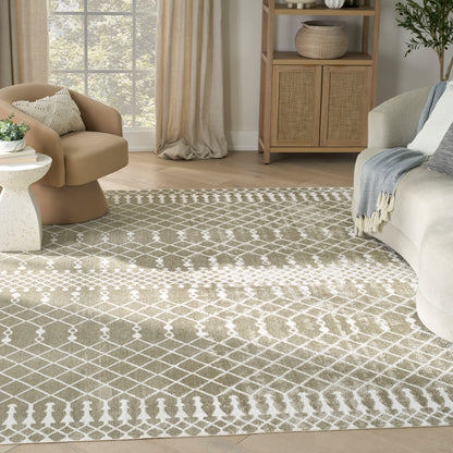 Neutral living room with beige lattice rug, tan curved accent chair, light sofa, and wooden cabinet with woven basket.