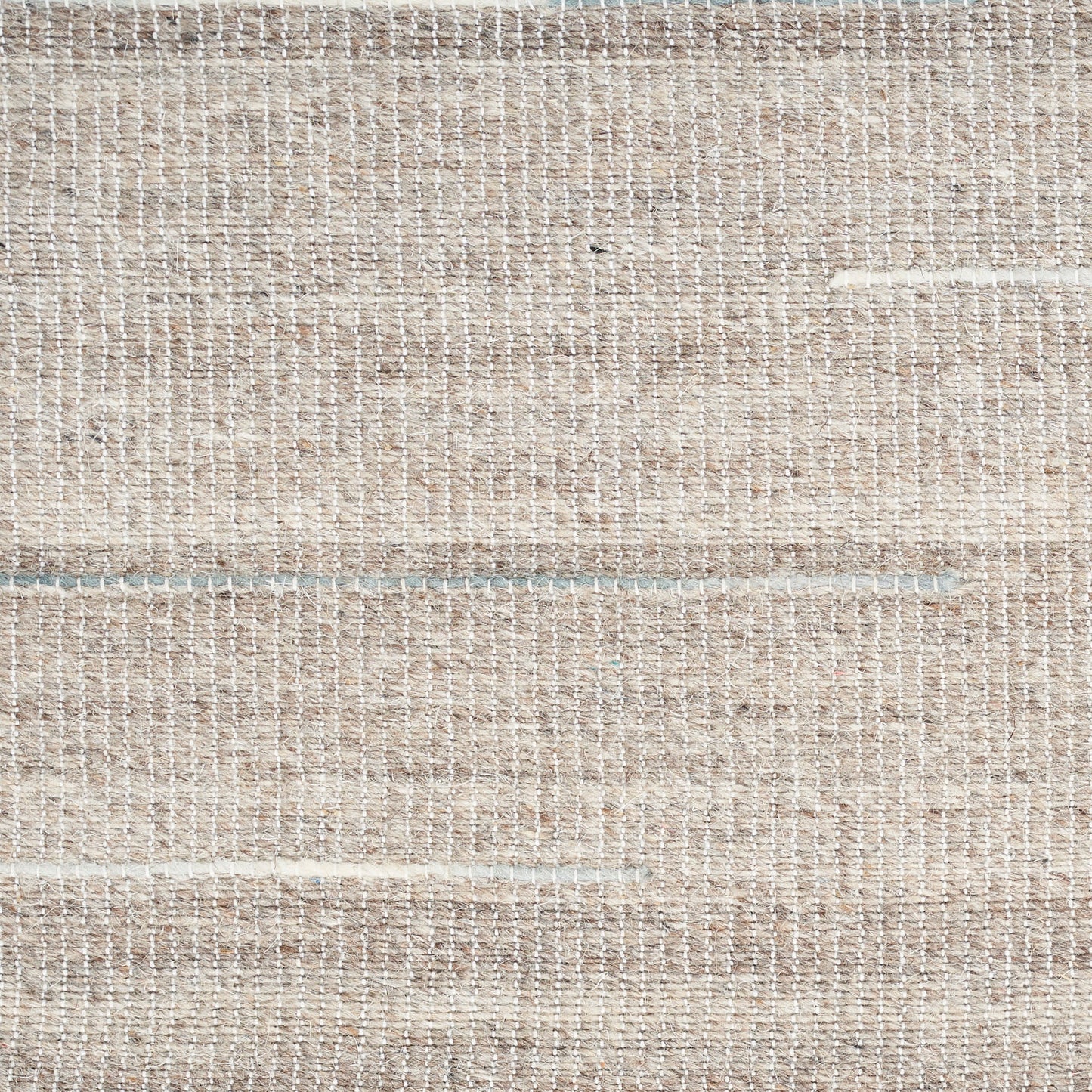 Beige natural-fiber woven rug with subtle horizontal stripes and textured grid weave.