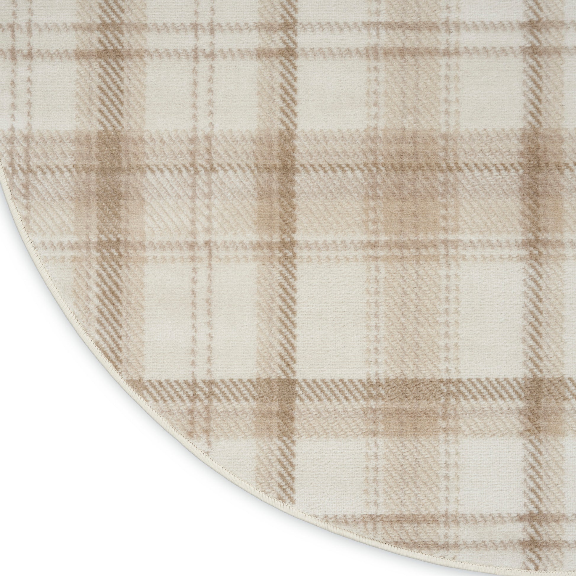Beige plaid rug with light brown checks, soft woven texture and rounded edge for cozy, neutral home decor.