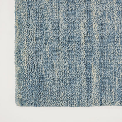 Blue loop-pile runner rug with plush shaggy texture, mixed indigo and light blues with cream specks; long rectangular 8' runner.
