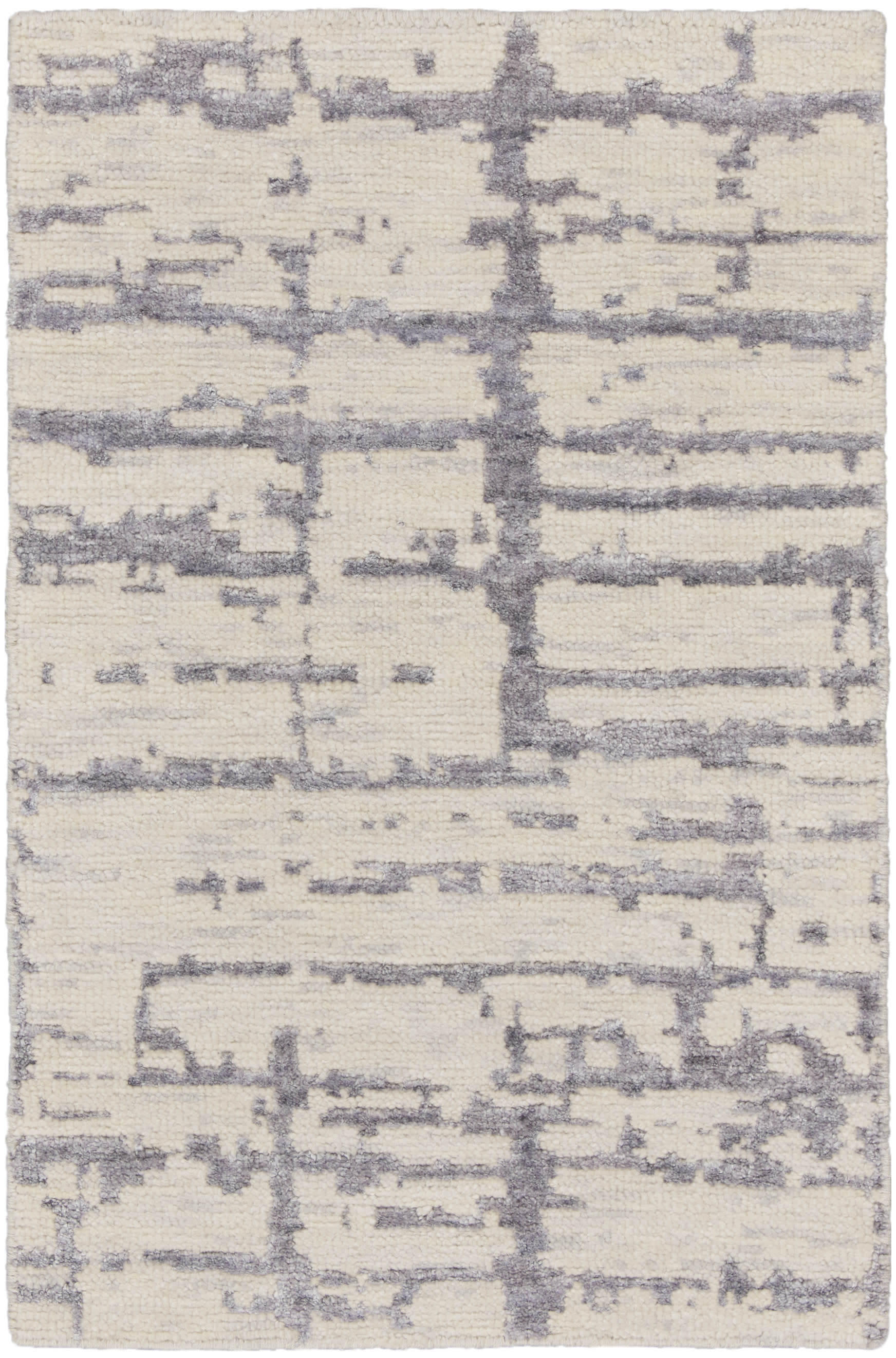 Cream shag rug with lavender-gray abstract lines and plush texture.