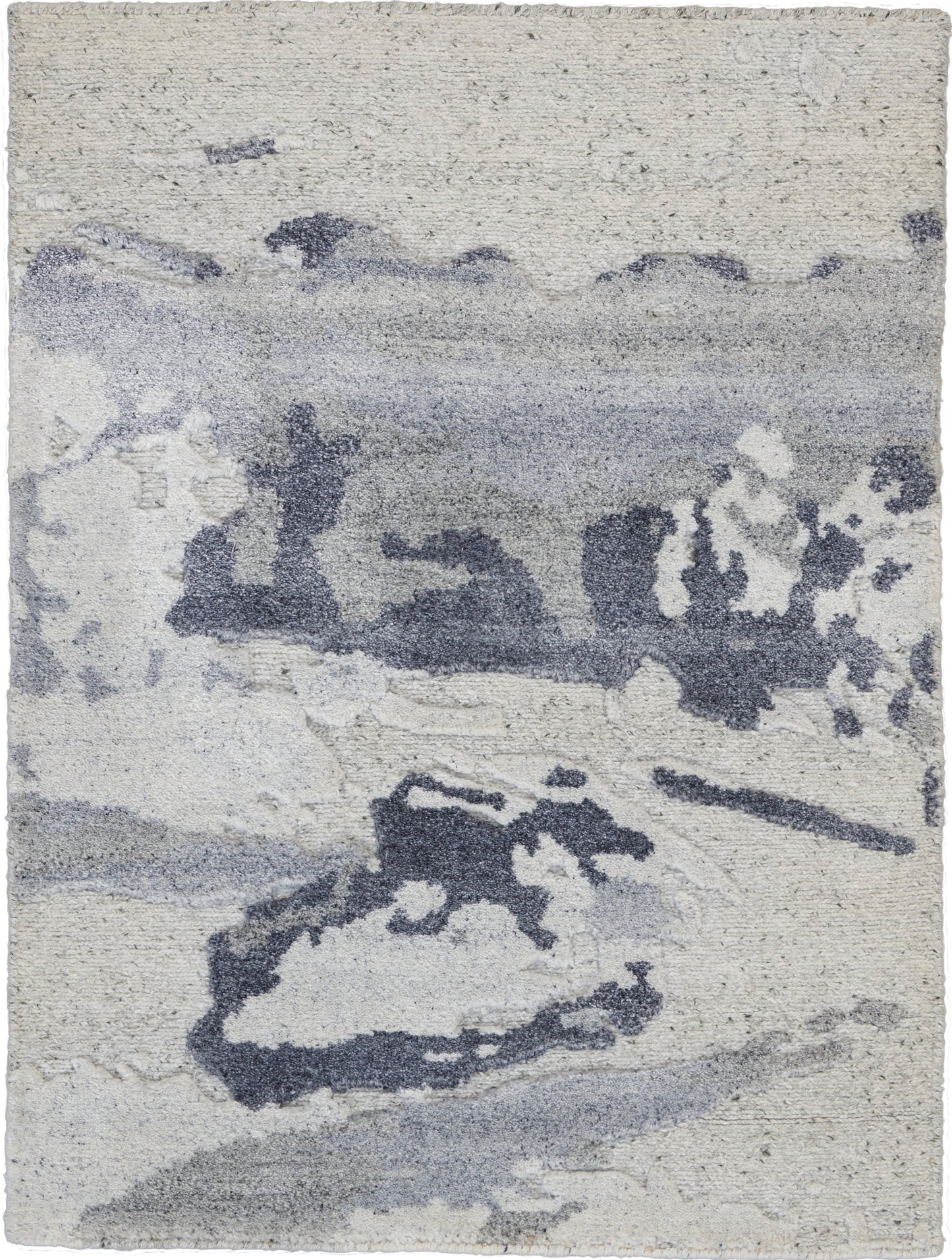 Abstract blue-gray and ivory area rug with watercolor-like shapes; plush, modern decor accent.