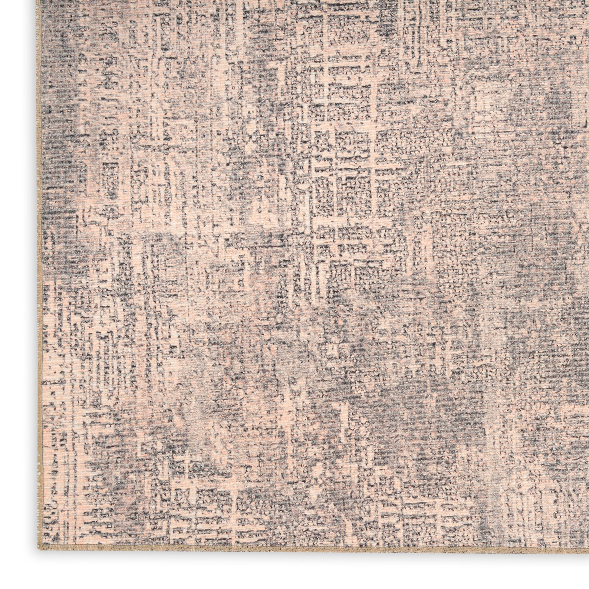 Gray and beige distressed woven area rug with abstract textured pattern.
