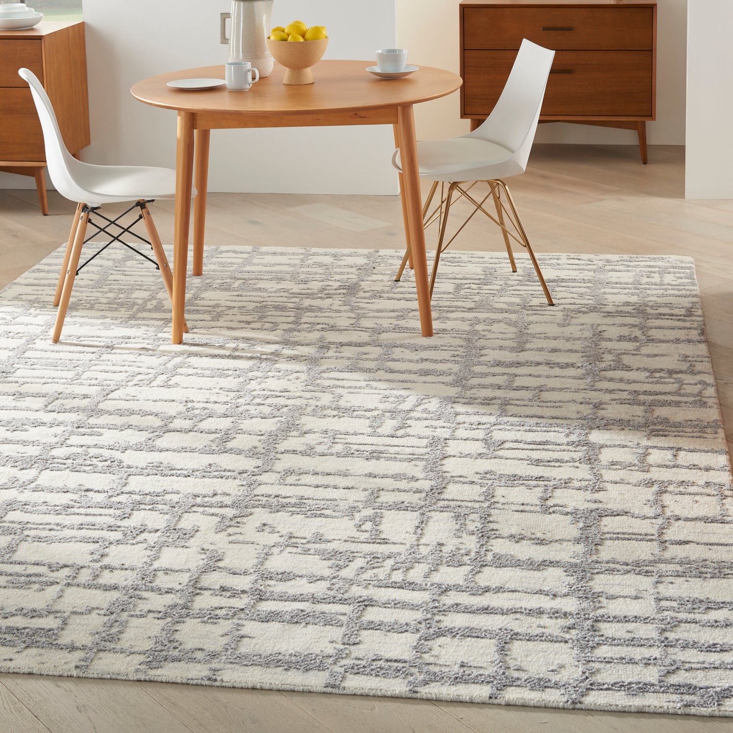 Gray geometric rug in a modern style, 8' x 10'.