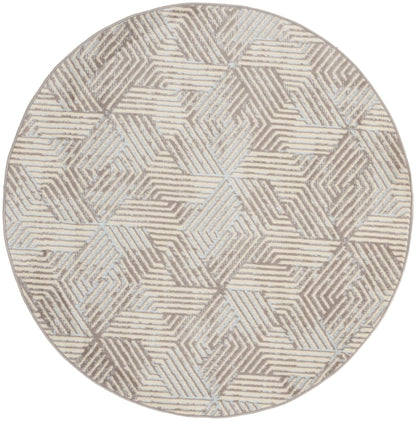 Round beige and taupe rug with geometric interlocking shapes and striped texture for modern decor