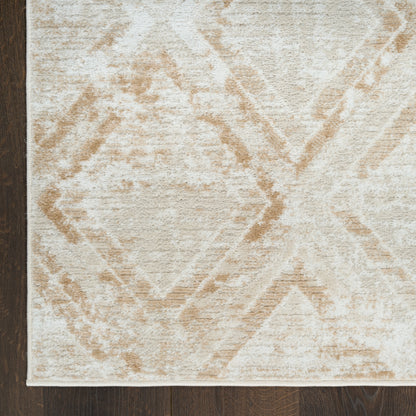 Beige cream area rug with subtle tan geometric diamond pattern; bound edges on dark hardwood floor