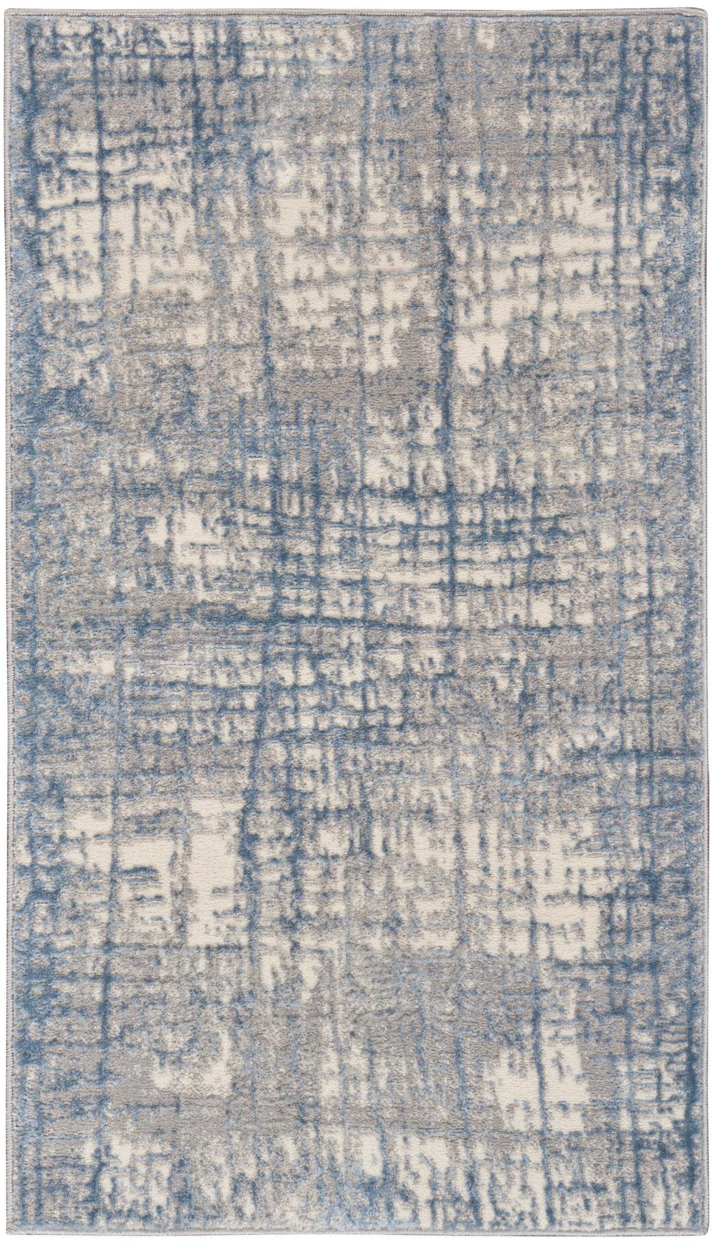 Rectangular area rug with blue and beige abstract distressed pattern; plush woven texture for modern living rooms.