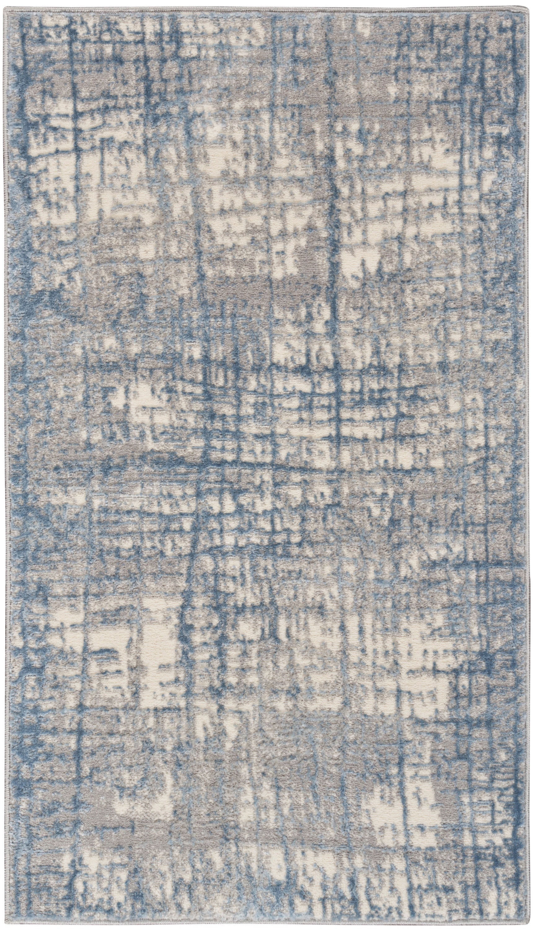 Rectangular area rug with blue and beige abstract distressed pattern; plush woven texture for modern living rooms.