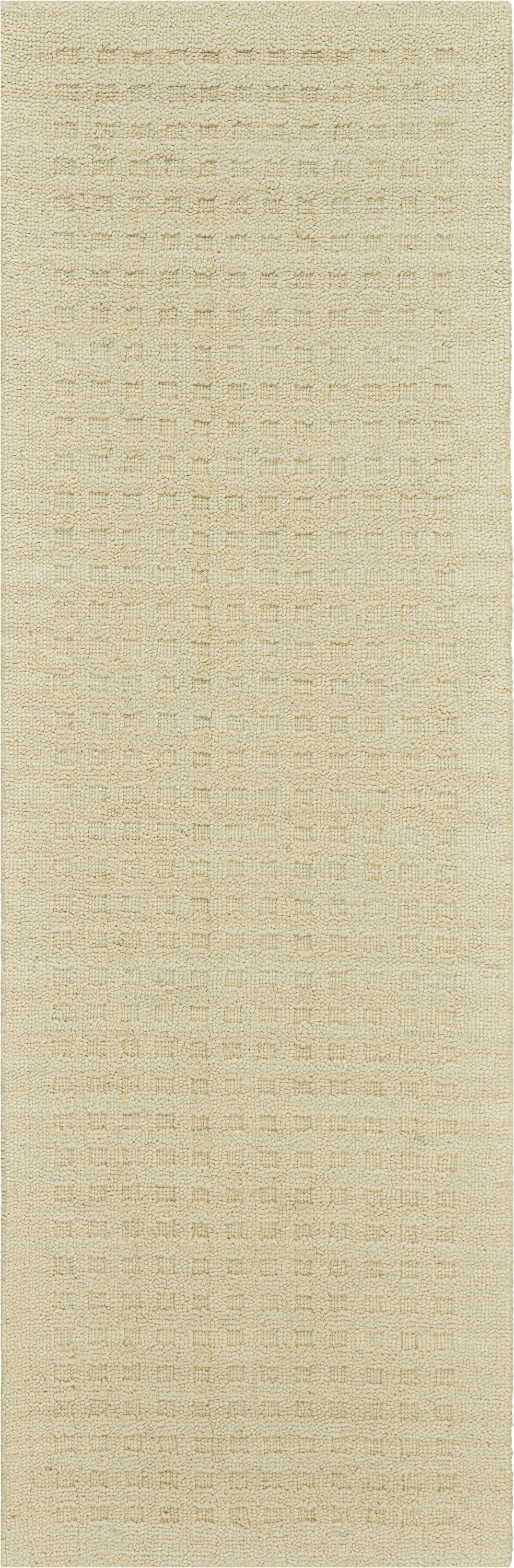 Beige textured loop-pile rectangular rug with subtle grid pattern; neutral, cozy living room decor.