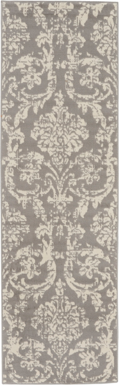Rectangular taupe runner rug with cream ornate damask pattern; soft woven textile for hallway or entry.