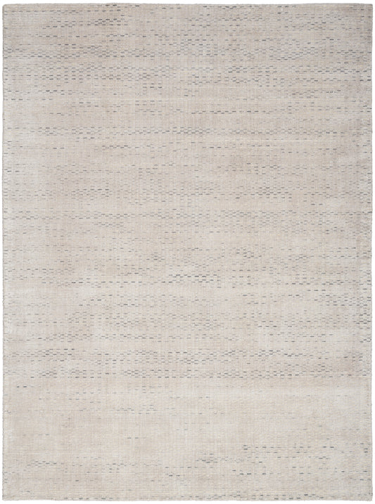 Cream beige flat-weave rug with a subtle textured pattern; rectangular natural-fiber area rug for living spaces.