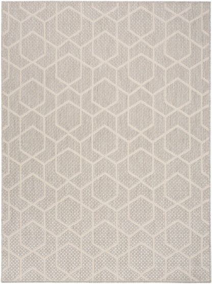 Neutral beige area rug with repeating hexagon lattice pattern & woven texture.