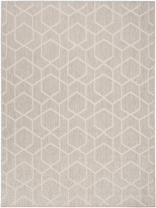 Neutral beige area rug with repeating hexagon lattice pattern & woven texture.