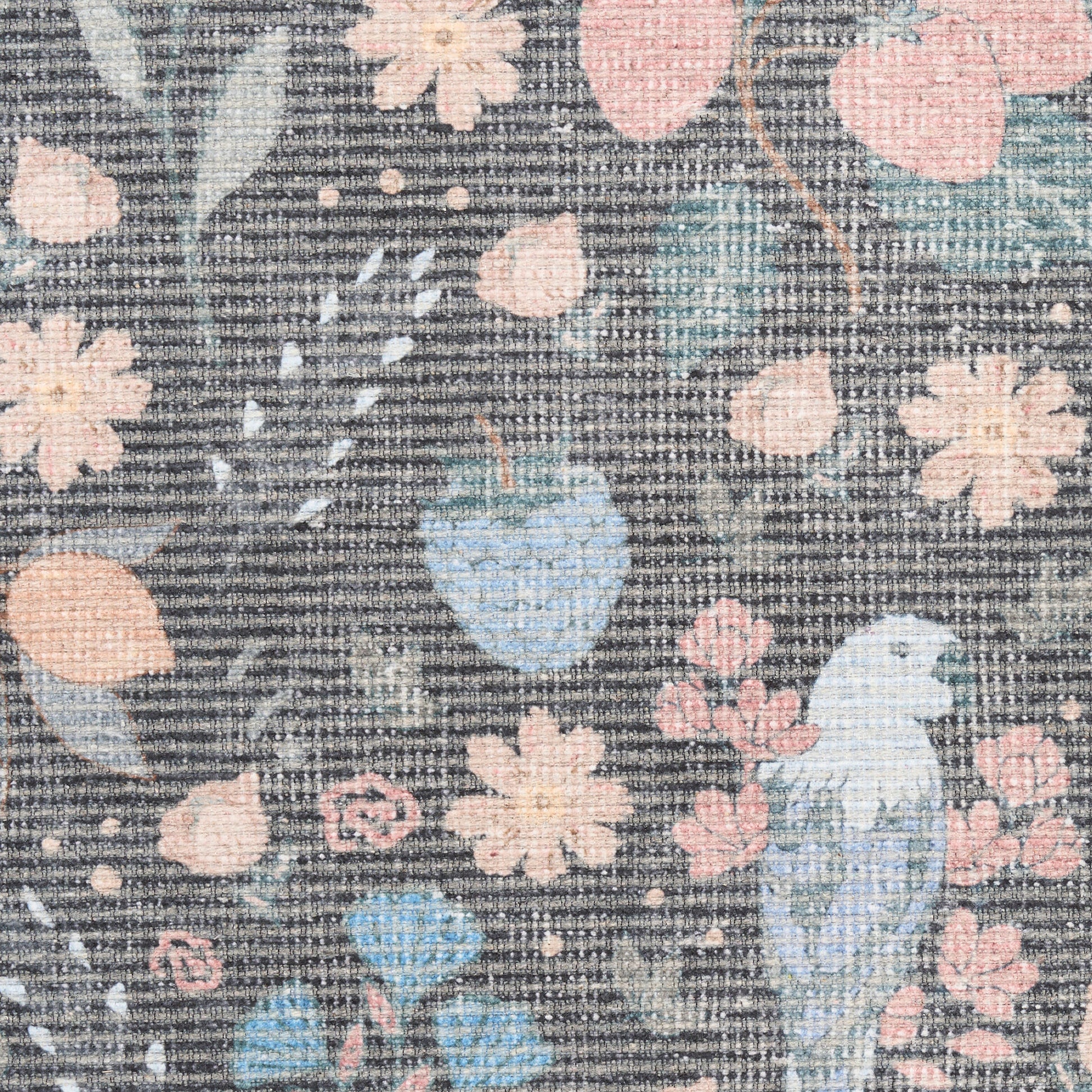 Rug with a woven floral pattern in pastel pink, blue and peach on a gray textured background, 5' x 7'.