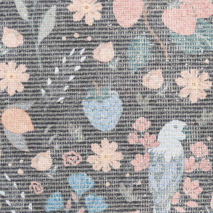 Rug with a woven floral pattern in pastel pink, blue and peach on a gray textured background, 5' x 7'.