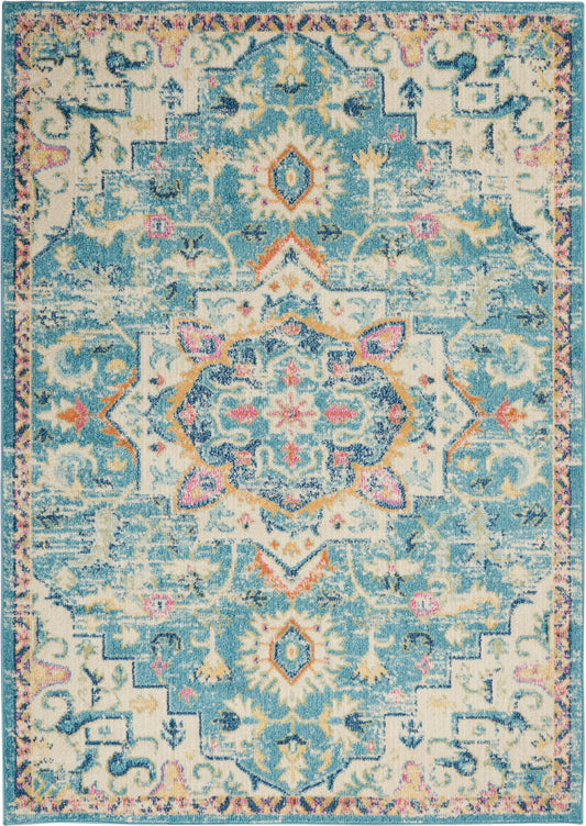 Distressed blue and ivory woven oriental rug with pink and orange accents and a central medallion, ornate border.