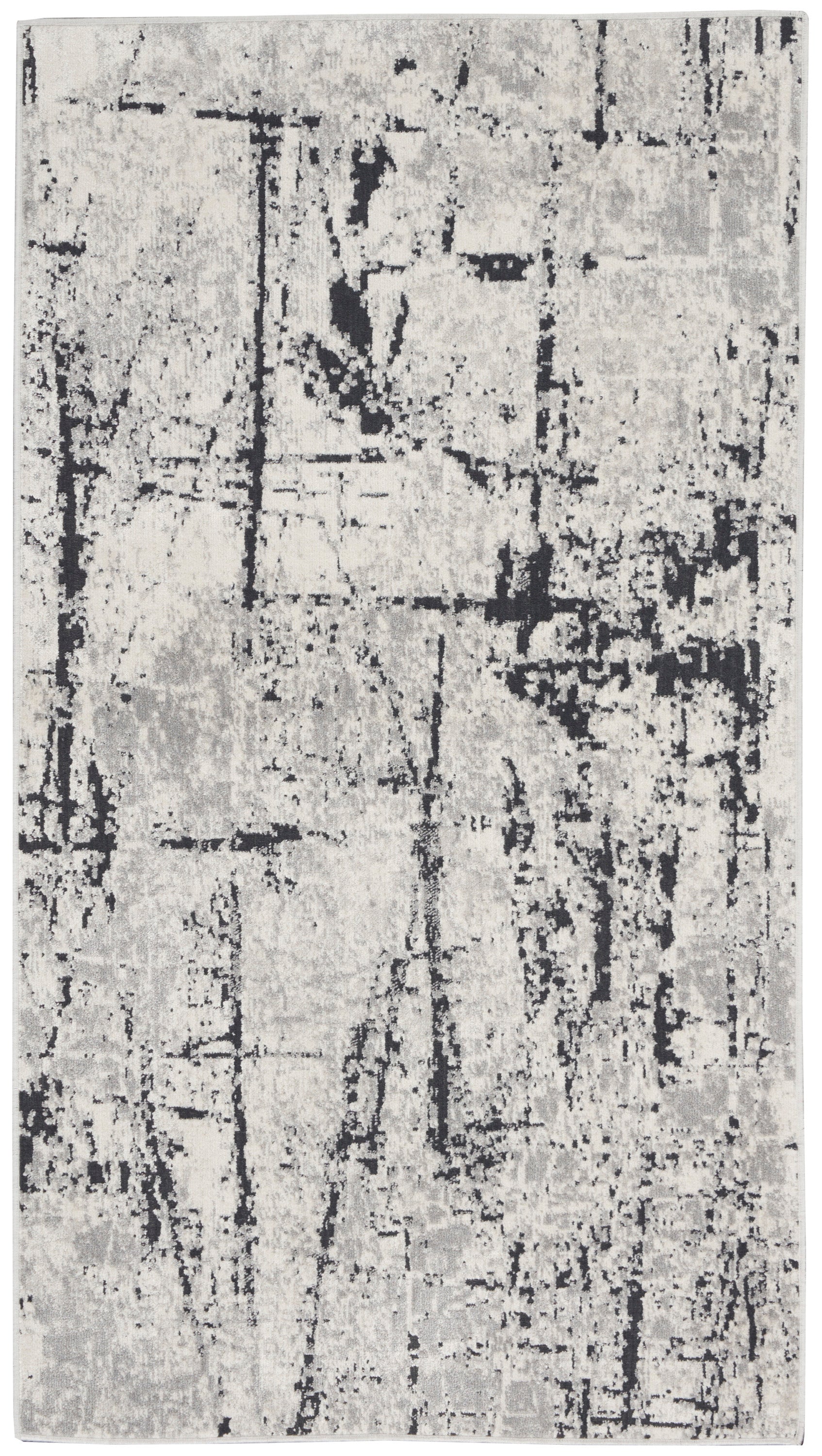 Rectangular gray and black abstract distressed rug, modern contemporary style for living room or hallway.