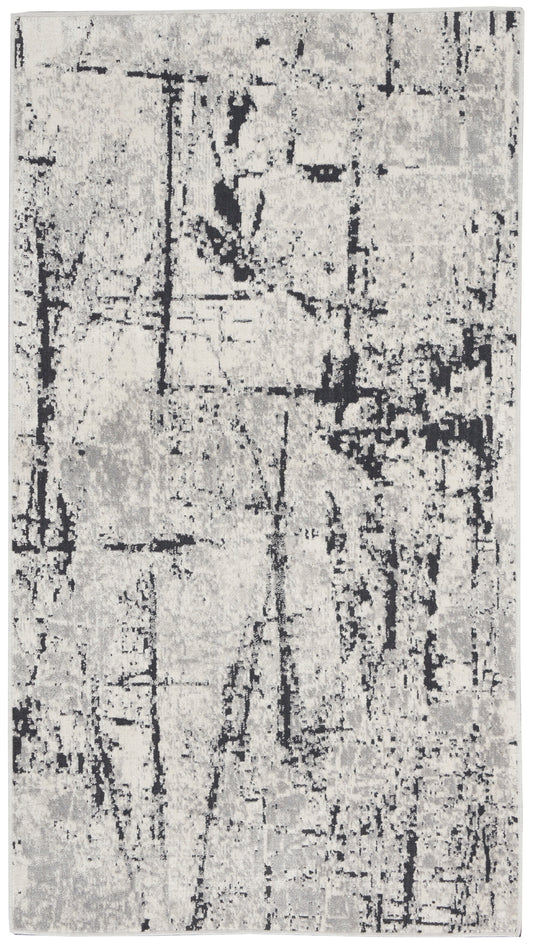Rectangular gray and black abstract distressed rug, modern contemporary style for living room or hallway.