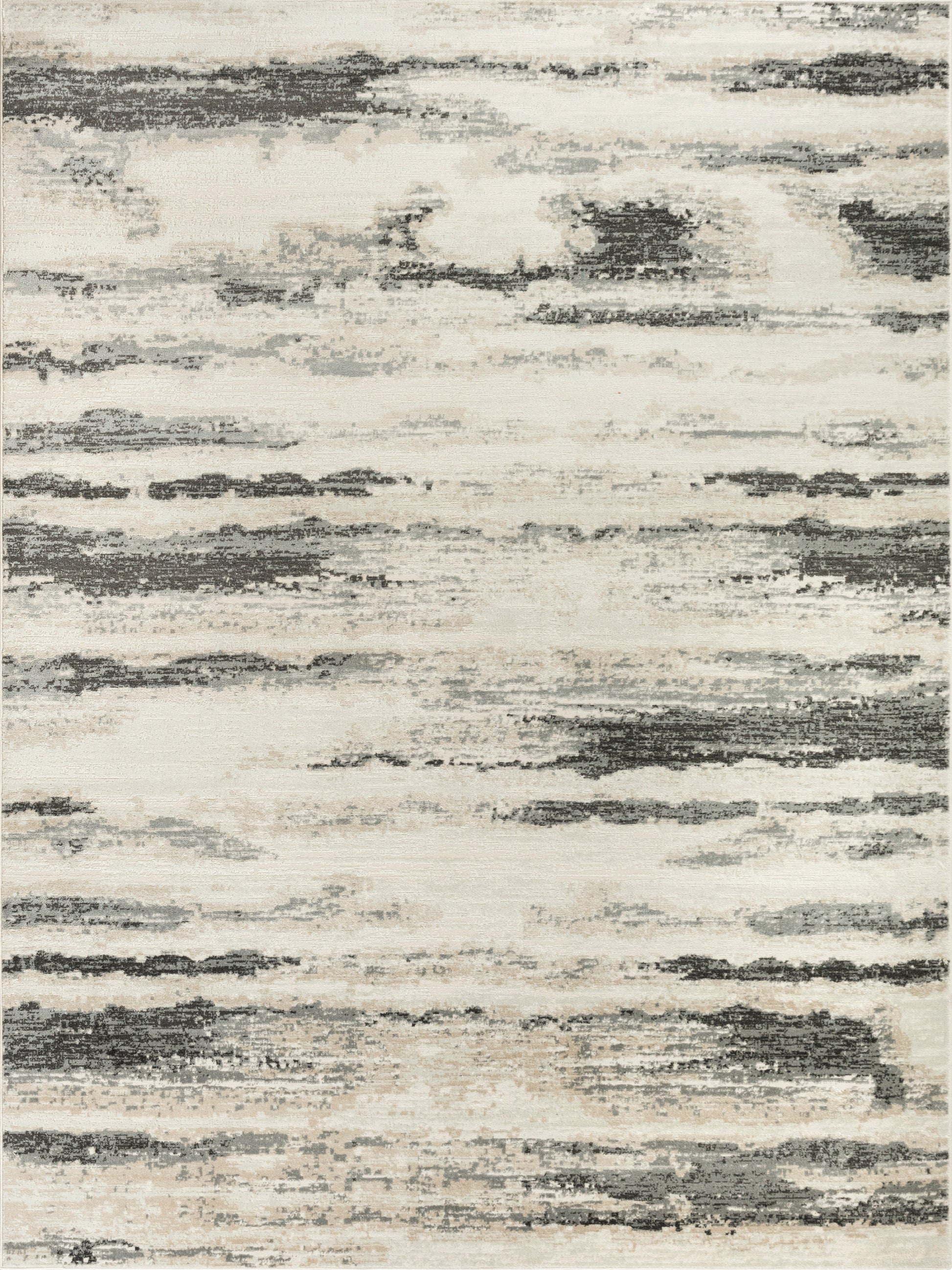 Beige abstract area rug with irregular charcoal gray brush strokes across a soft cream background.