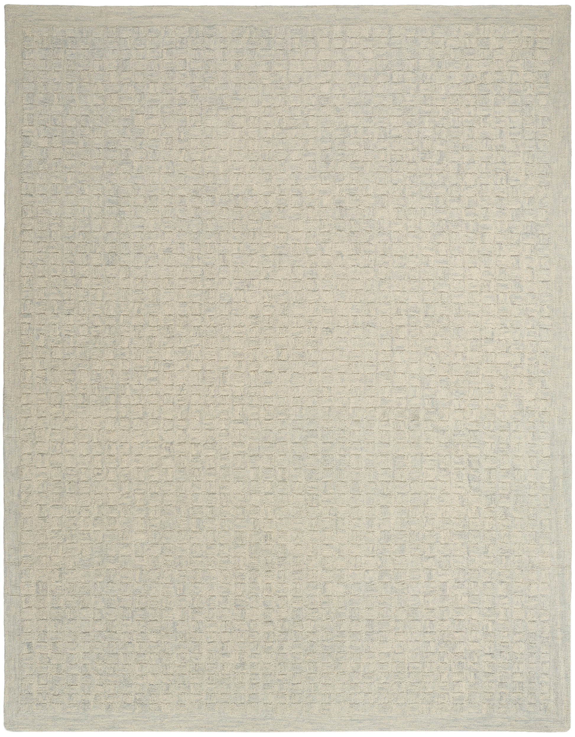 Beige textured rug with a subtle waffle/grid pattern; rectangular, neutral-toned, soft woven surface.