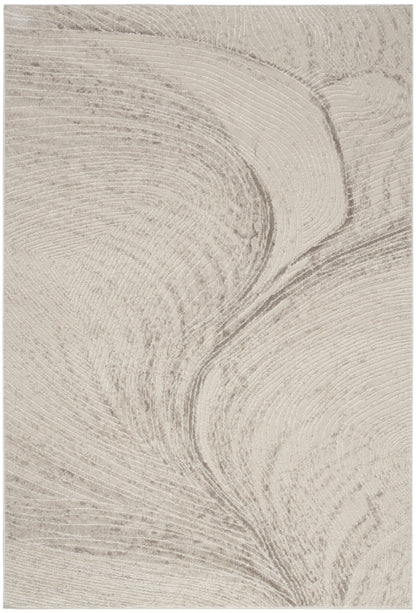 Beige cream rug with flowing taupe wood-grain swirl; soft, modern textured textile.