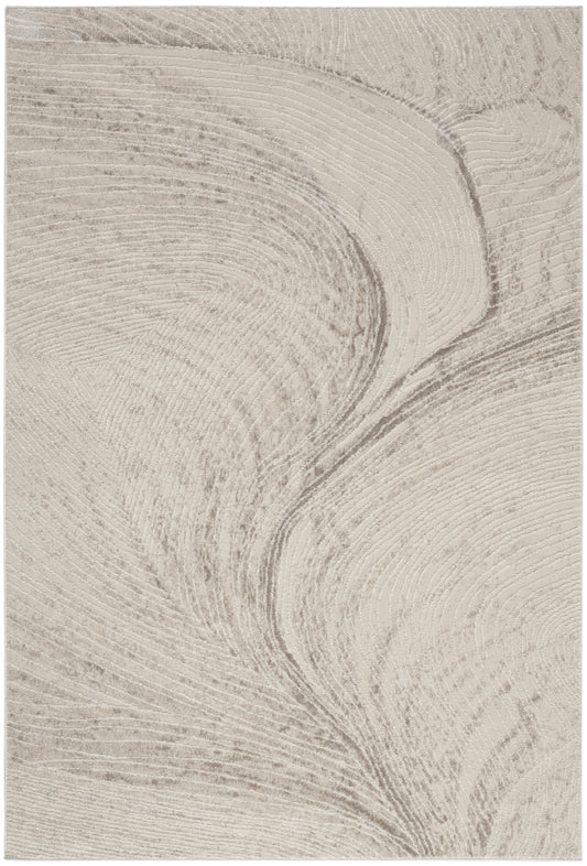 Beige cream rug with flowing taupe wood-grain swirl; soft, modern textured textile.