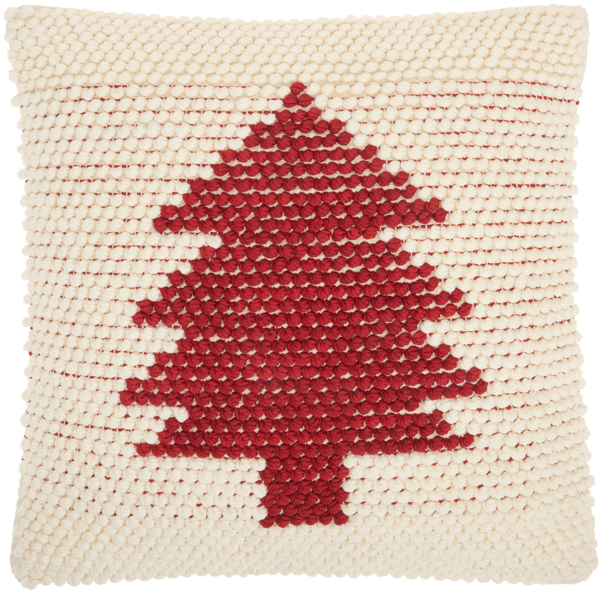 Cream pom-pom tufted square pillow with a red pixelated Christmas tree design, festive home decor.