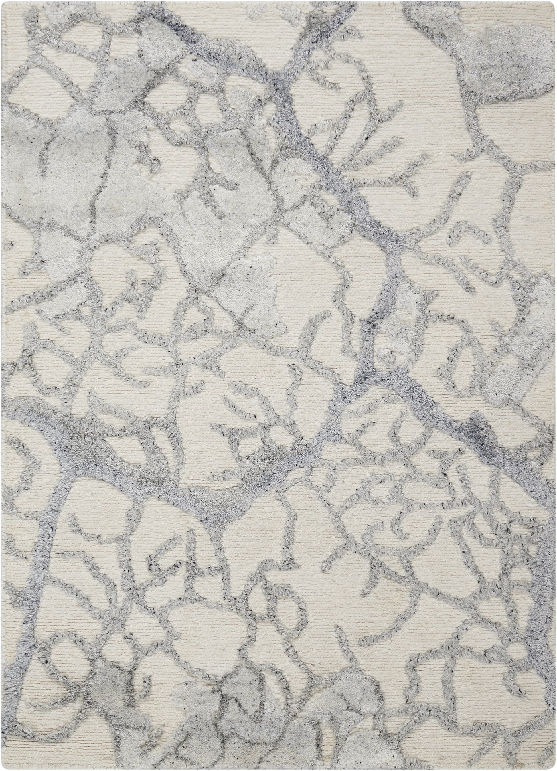 Cream rug with gray branching pattern and soft shag texture; modern organic design.