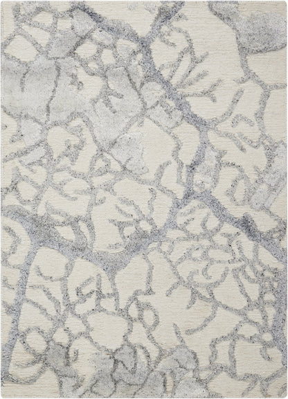 Cream rug with gray branching pattern and soft shag texture; modern organic design.