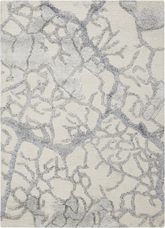 Cream rug with gray branching pattern and soft shag texture; modern organic design.